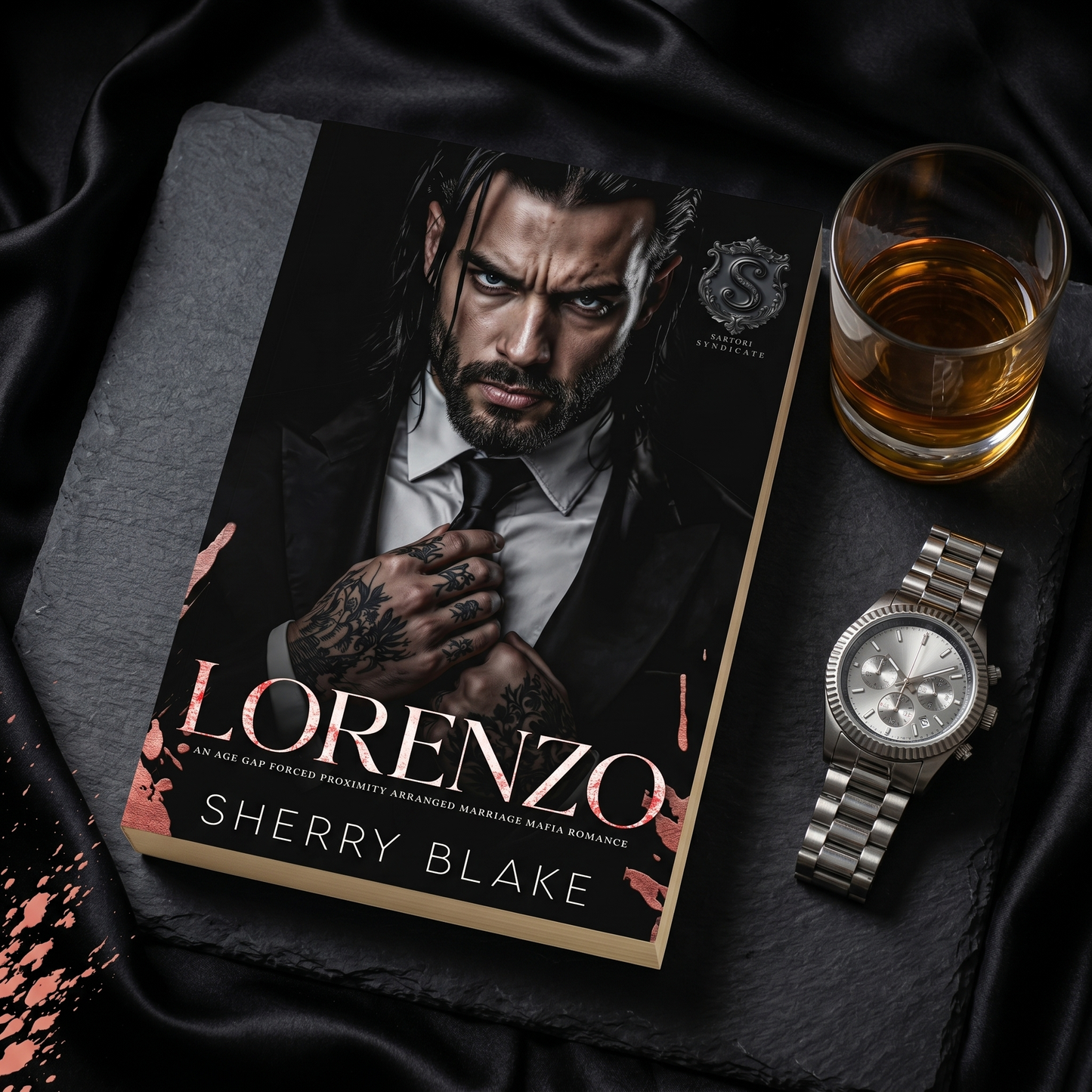 Lorenzo by Sherry Blake paperback with a watch, dark mafia romance flat lay